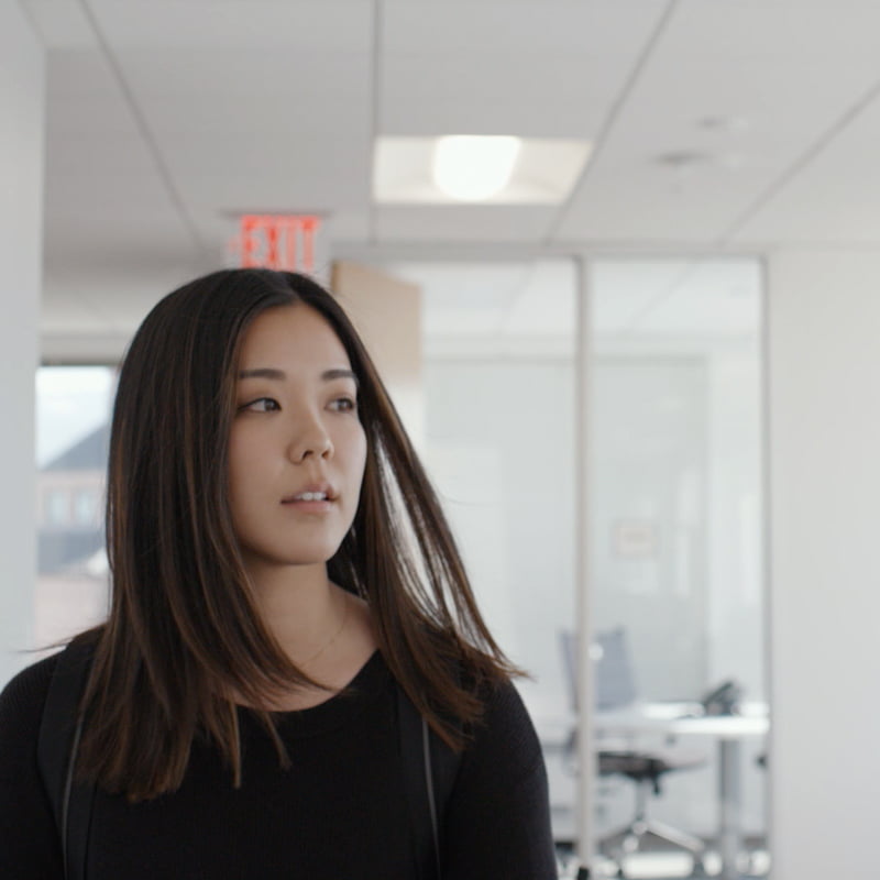 AliveCor employee Lauren walking in the office